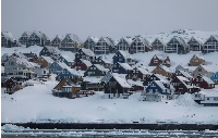 Snow covers the city of Nuuk, Greenland, February 9, 2025
