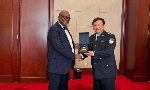 Ghana's Ambassador Kojo Bonsu with China's Police Chief Wang Yong