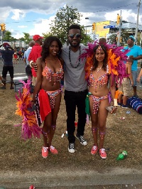 Ahkan with two Caribbean ladies