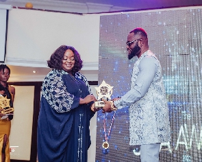 Roselyn Ngissah receiving her award