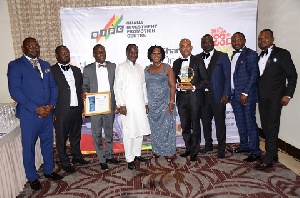 Justmoh Construction staff with the award