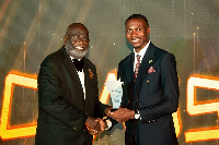 Francis Dadzie receiving the award