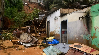 A house damaged by landslides in Attecoube, Abidjan, Ivory Coast. Pic: AP/Photo Diomande Ble Blonde