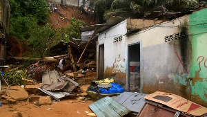 A house damaged by landslides in Attecoube, Abidjan, Ivory Coast. Pic: AP/Photo Diomande Ble Blonde A house damaged by landslides in Attecoube, Abidjan, Ivory Coast. Pic: AP/Photo Diomande Ble Blonde