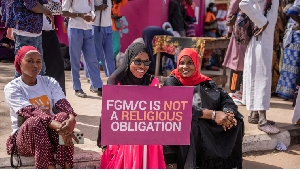 Gambians protest against a bill aimed at decriminalizing female genital mutilation