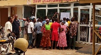 Some customers verifying their details at the Bolgatanga branch of DKM