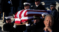 Di body of Jimmy Carter don arrive in Washington DC