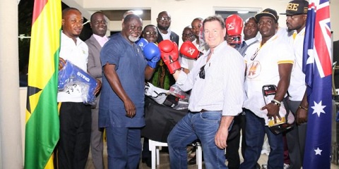 Azumah Nelson CEO of Geodrill Limited, Dave Harper presented boxing equipment to the team