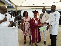 Kweku Addo watch on as certificates were given to students