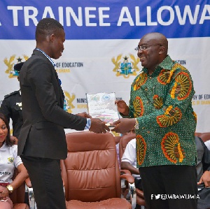 Vice President Dr Bawumia received the plaque on the President's behalf