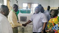 Mr. George Kwaku Kumi (R) said it was the club's contribution to helping save lives