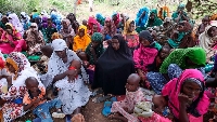 Women and children attending a  UNDP distribution exercise at Danisa Refugee camp, Kenya