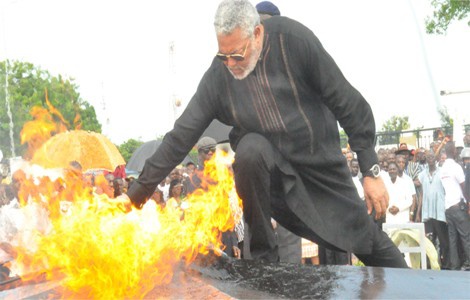 Rawlings dips hand into blazing fire