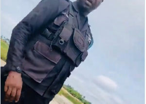 The officer is seen at a galamsey site interacting with a man behind the camera