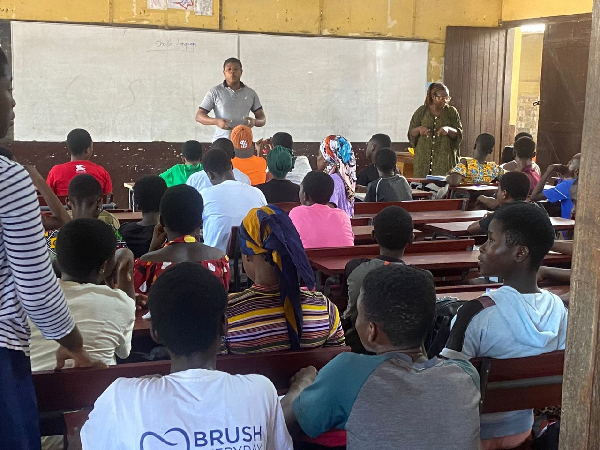Ibrahim Halidu is seen here speaking to some of the BECE candidates