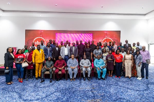 Goosie Tanoh pictured with stakeholders after the dialogue session