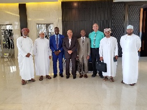 Dr. Owusu Kizito, Chairman/CEO of Investigroup with Dr. P Mohamed Ali Chairman of MFAR Group, others