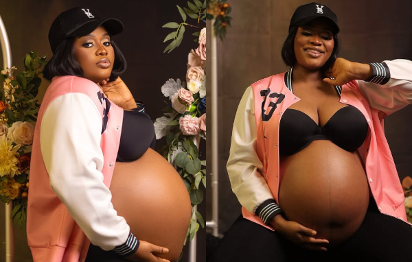 MzGee showing off her baby bump