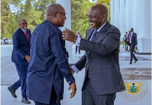 President John Dramani Mahama (L) seen ecchanging pleasantries with President William Ruto of Kenya