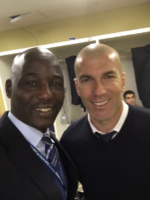Fifa General Coordinator Anthony Baffoe in a pose with Real Madrid Coach Zidane
