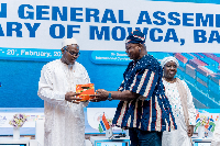 Minister of Transport Joseph Nikpe (in fugu) making a presentation at the summit