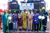 Photo of Lawyer Edudzi Tameklo and some officials at the commissioning of bolehole