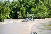 A vehicle caught in a flood