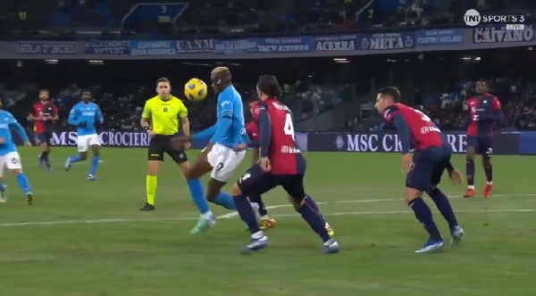 Victor Osimhen takes on Napoli defenders