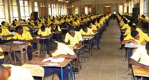 Students writing WASSCE exams