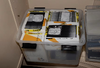 Material marked with evidence tape inside the home of Jeffrey Epstein