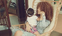 Nadia Buari with one of her twins