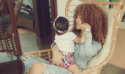 Nadia Buari with one of her twins