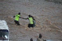 Flood waters swept through Accra on Thursday