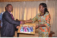 Bishop Awuah presenting a plaque to the Minister