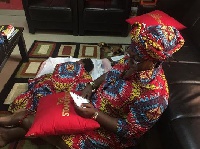 Gifty Anti and her baby sleeping in her office