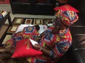 Gifty Anti and her baby sleeping in her office
