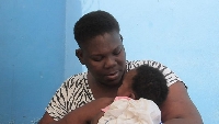 A picture of 32- year- old Blessing with her daughter
