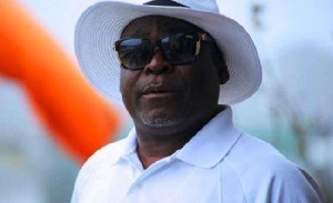 Kofi Adjorlolo Wears White Hat