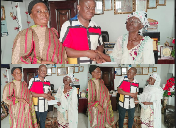 Dr. William Atta Owusu shakes hands with an elderly woman