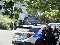 Police deployment outside the scene of the shooting