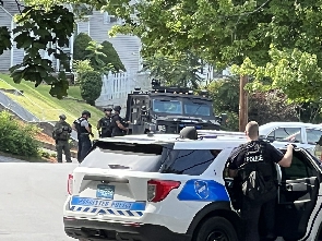 Police deployment outside the scene of the shooting