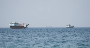 Vessels sail near the Strait of Hormuz, as seen from Musandam, Oman