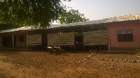 A section of the school's classroom block in view