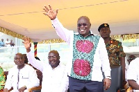 President Akufo-Addo waves some workers marching during the  May Day celebrations