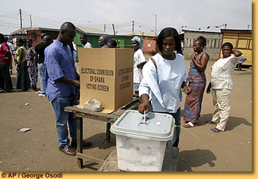 Woman casts her ballot.     File photo.