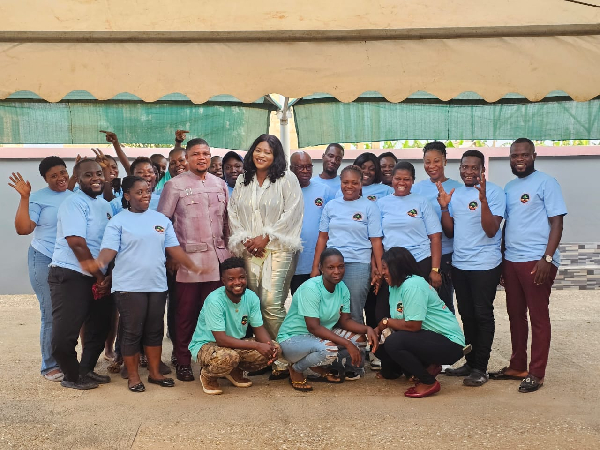 Prof Wiafe Akenteng with is staff after the day's health activities