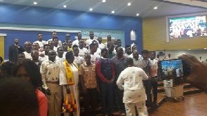 Bishop Agyin Asare in a group picture with Hearts Of Oak team