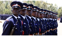 police recruits march during a passing-out parade at Kiganjo Training College in Nyeri County