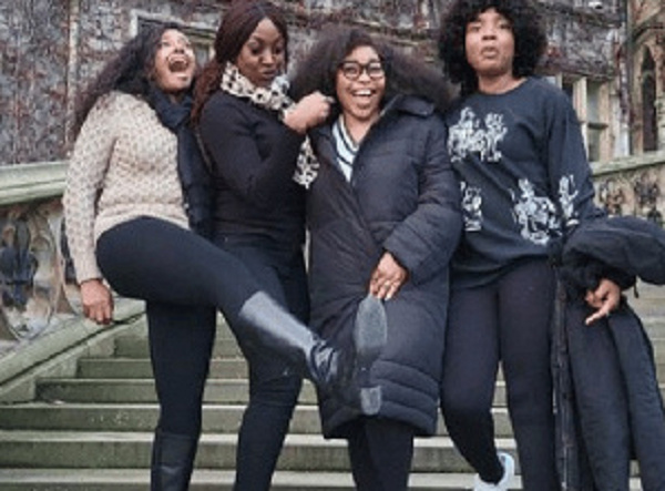 Rita Dominic (middle) and some friends at her wedding