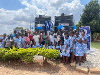 Some of the students by the water tankers